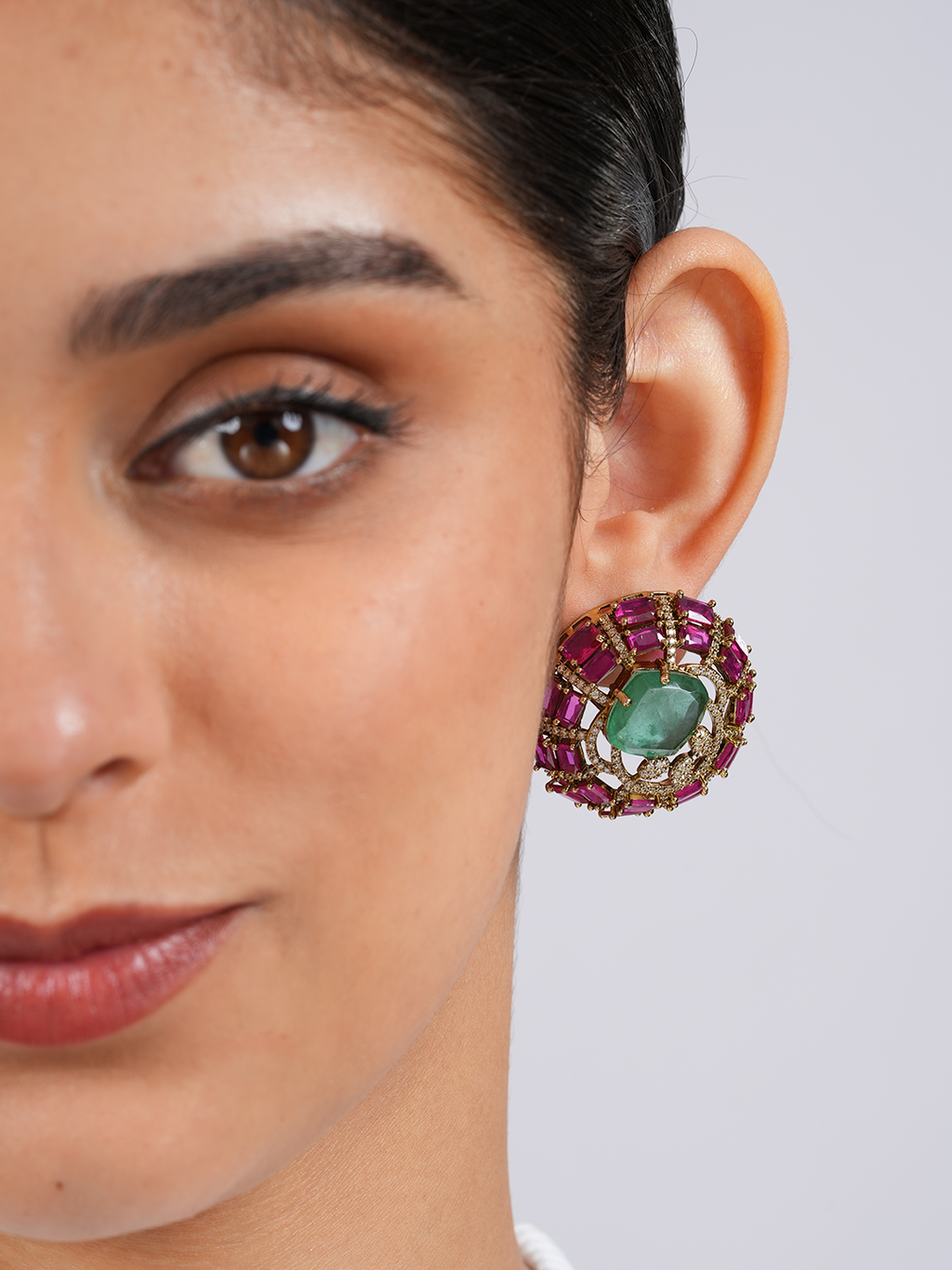 Emerald Statement Studs