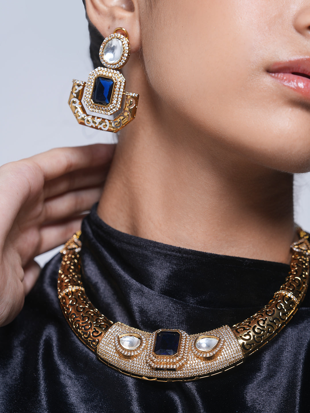 Designer Golden CZ Hasli With Blue Stone