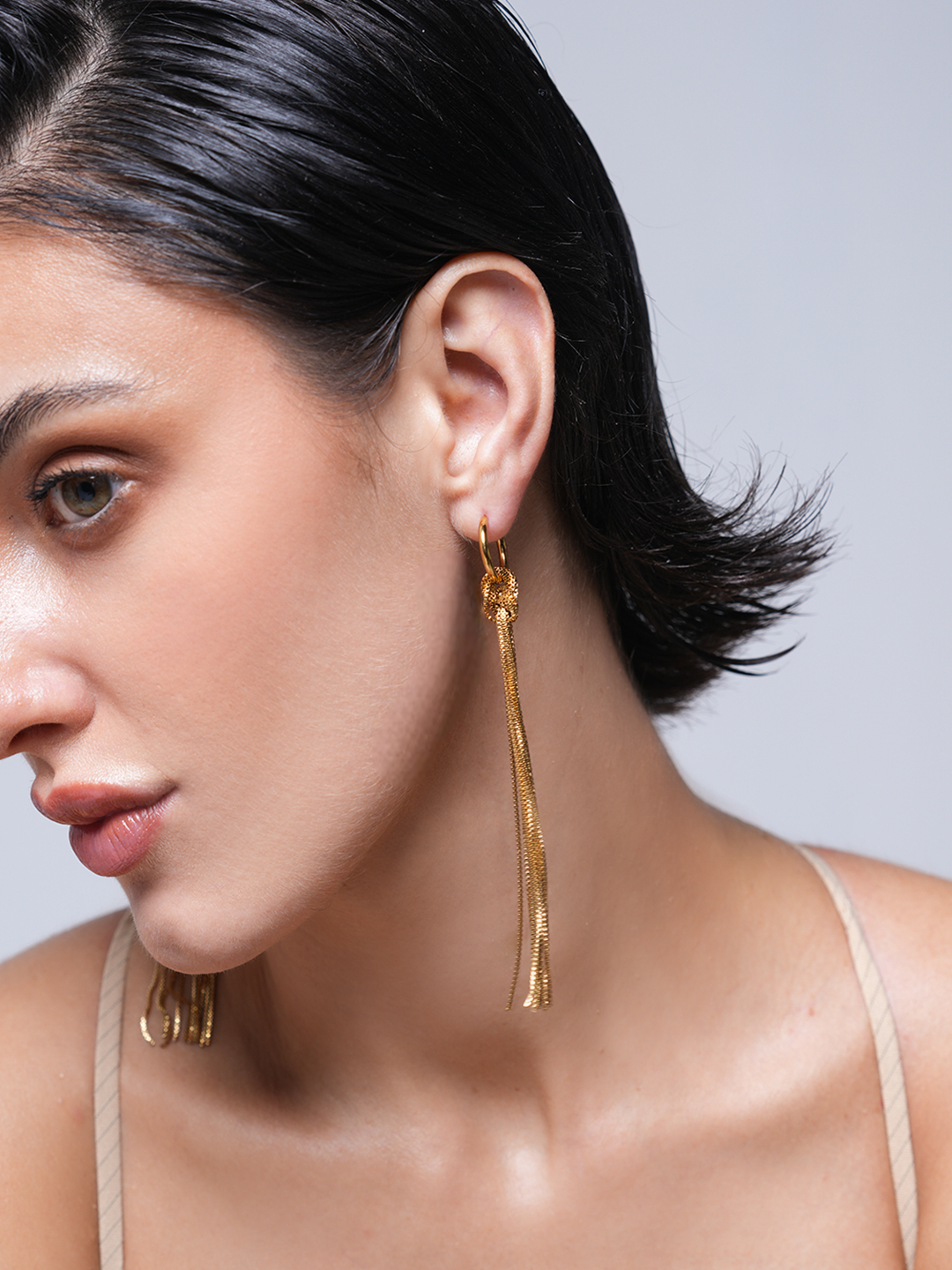 Snake Bone Chain Knot Tassel Earrings